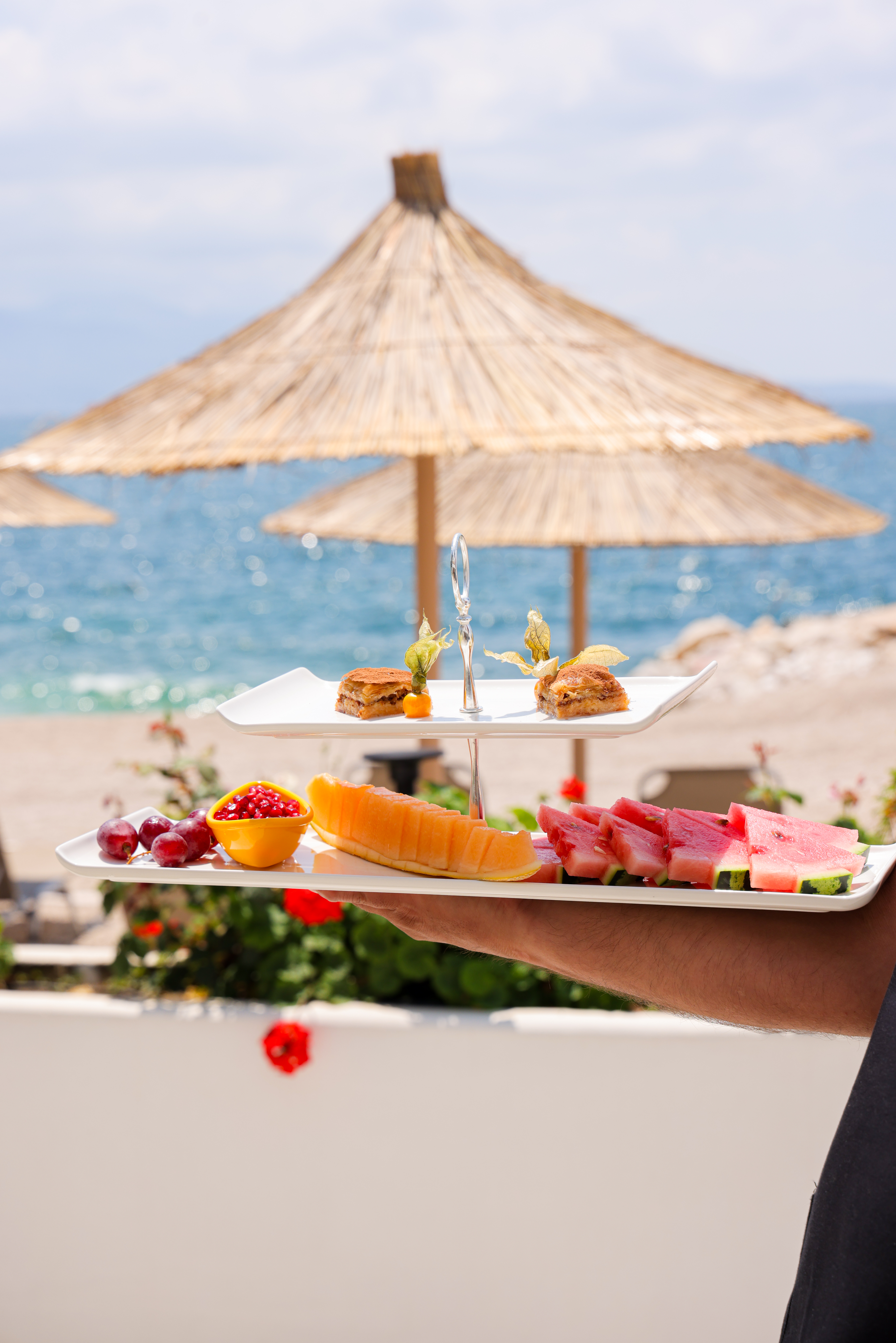 Beach service with Ionian Sea backdrop